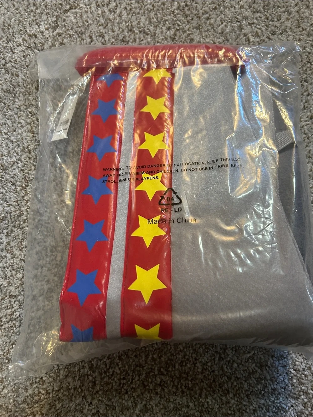 Hanna Andersson Silver Rocket Wings with Red and Yellow Stars